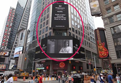 Hookist extraordinaire, Shefik Macauley's Times Square billboard!